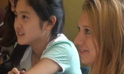 Two girl students enjoying their class